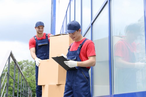 Local movers navigating apartment access and parking in Denmark