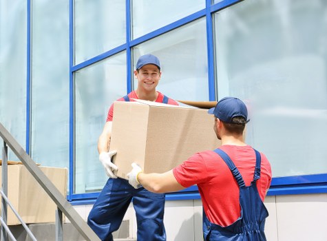Local moving team handling packing in a Danish property