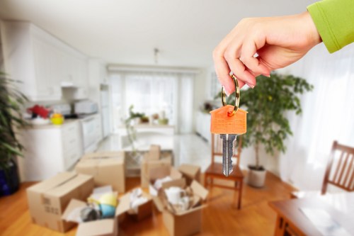 Professional moving process showing organized boxes and furniture transport