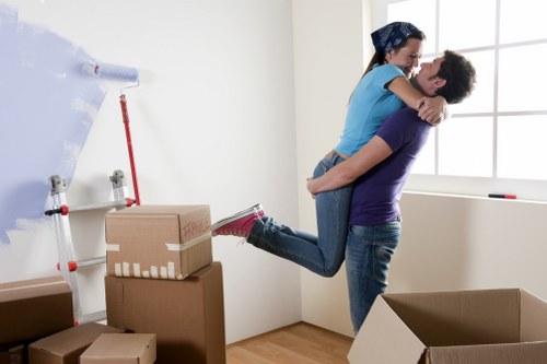 Unloading household items at a new home in Denmark