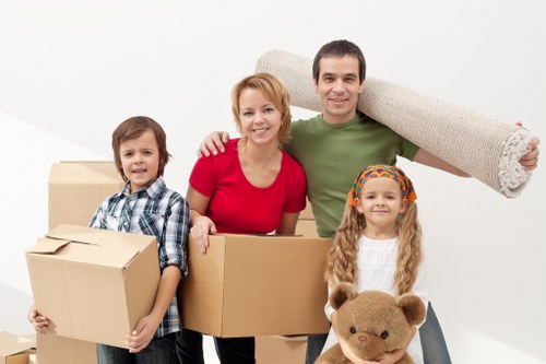 Moving crew handling desks and equipment during an office move