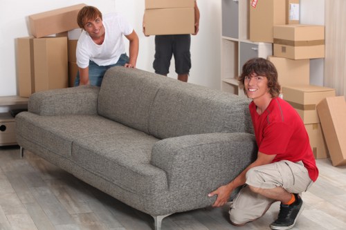 Furniture and boxes being packed into a removals van in Denmark