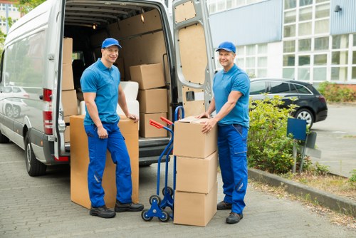 Office relocation service with boxes and equipment in Denmark